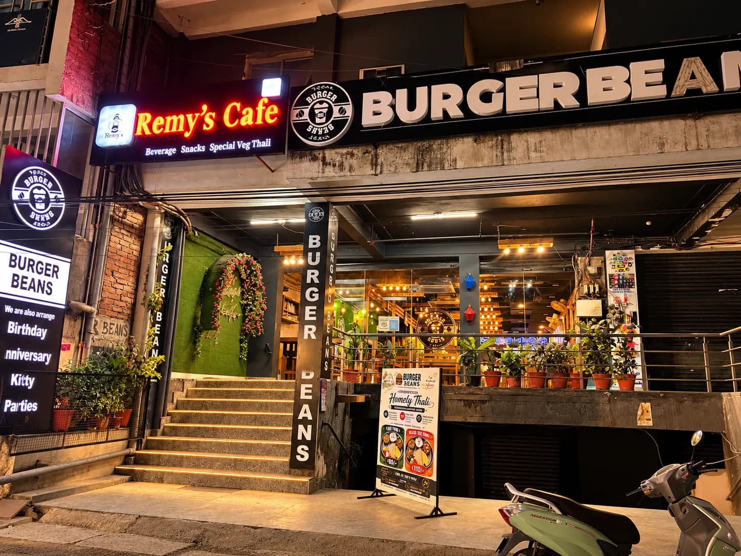 The Burger Beans storefront lit up at night